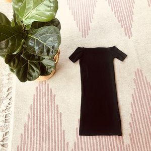 Sexy, black, off the shoulder dress.